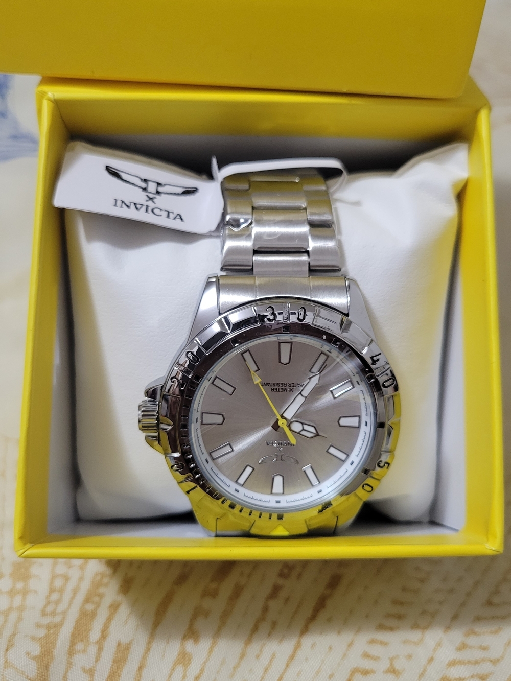 Invicta Stainless Steel Silver Watch with Yellow Accent